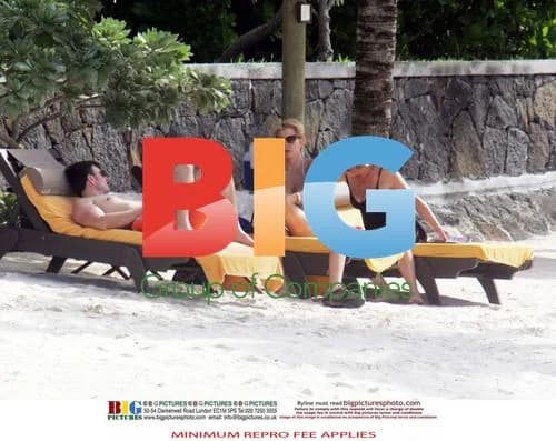 Heather Mills on beach with boyfriend