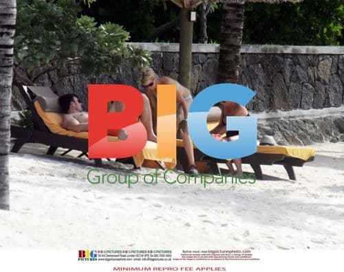 Heather Mills takes beach vacation with boyfriend