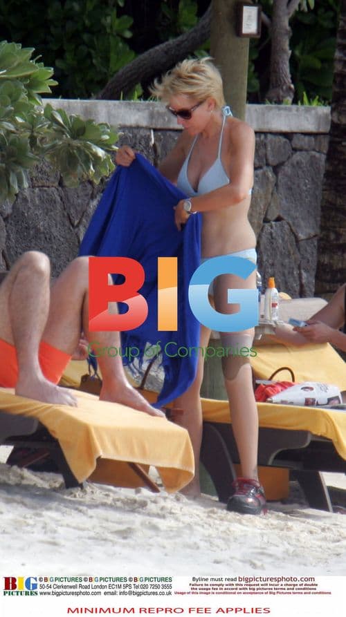 Heather Mills on beach with boyfriend