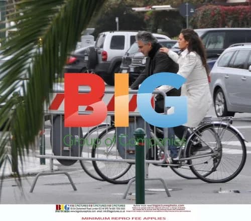 Andrea Bocelli shops at Gucci with girlfriend and son