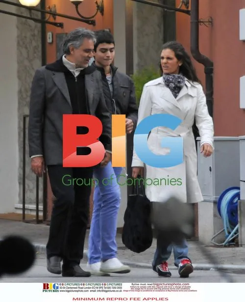 Andrea Bocelli shops with girlfriend and son