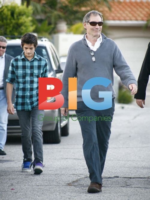 Timothy Dalton leaves Oksana Grigorieva's home