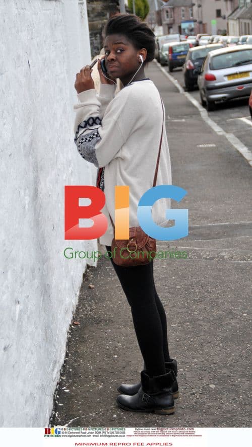 Gamu Nhengu Listens to Music at Home