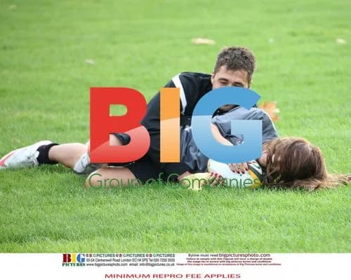 Gavin Henson and Katya Virshilas practice rugby tackles