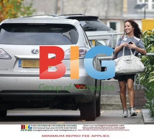 Gavin Henson and Katya Virshilas practice rugby tackles