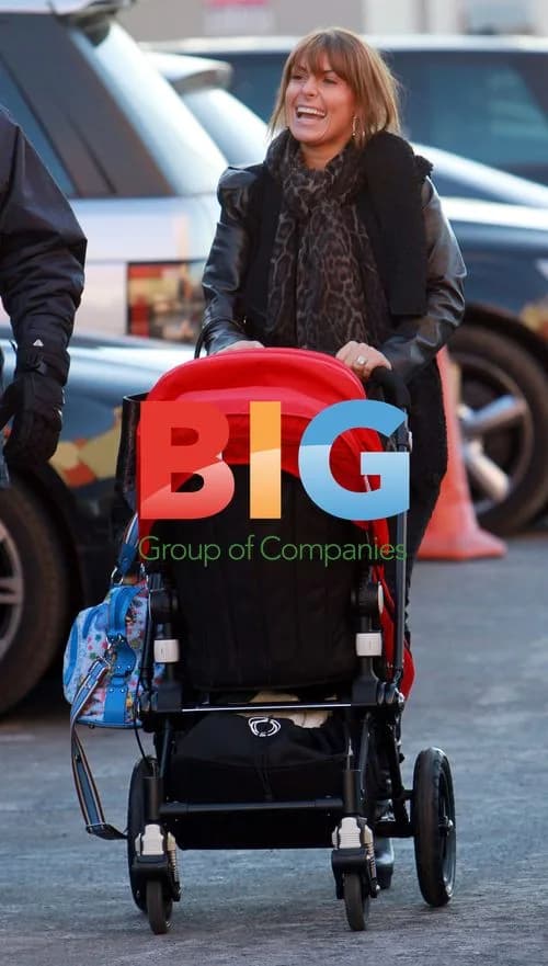 Coleen Rooney arrives at Old Trafford with son