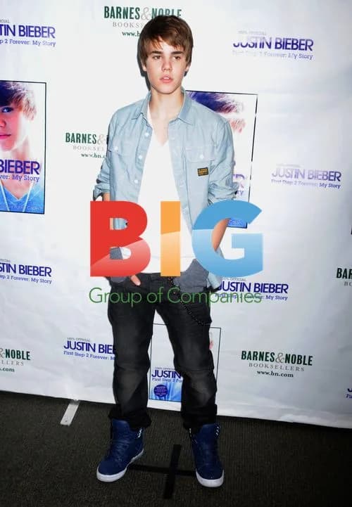 Justin Bieber Signs First Step 2 Forever Book