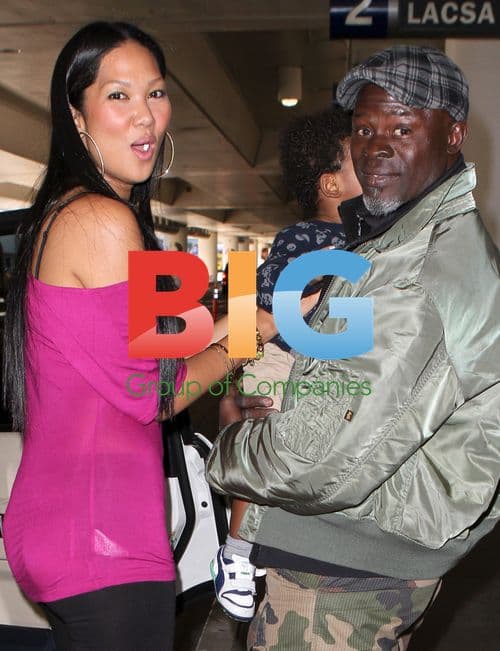 Djimon Hounsou and Kimora Lee Simmons at LAX