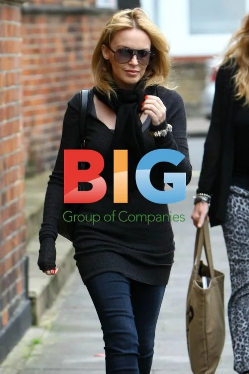 Kylie Minogue Visits Management Offices