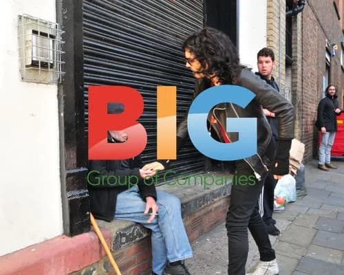 Russell Brand donates to homeless man in Liverpool