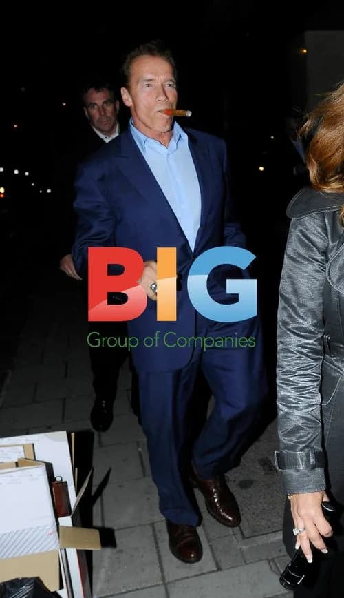 Arnold Schwarzenegger Enjoying Cigar in London