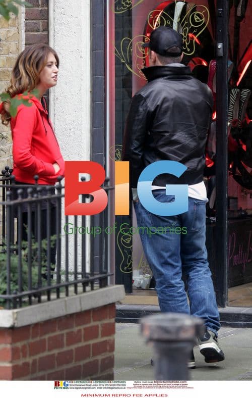 Robbie Williams Seen Out with Mystery Woman