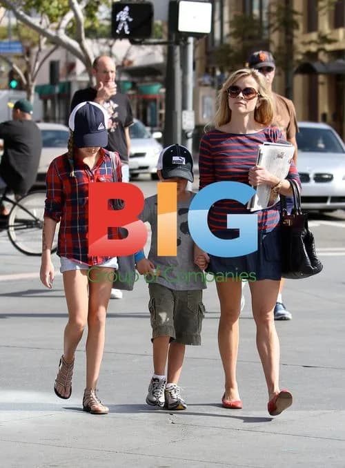 Reese Witherspoon with kids running errands