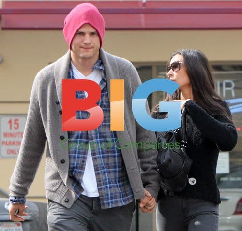 Ashton Kutcher Helps Demi Moore