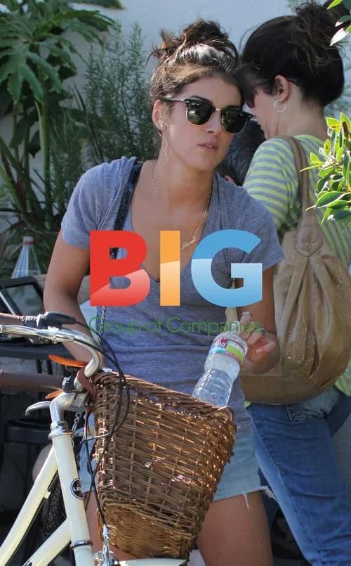 Shenae Grimes Locking Up Bike in LA