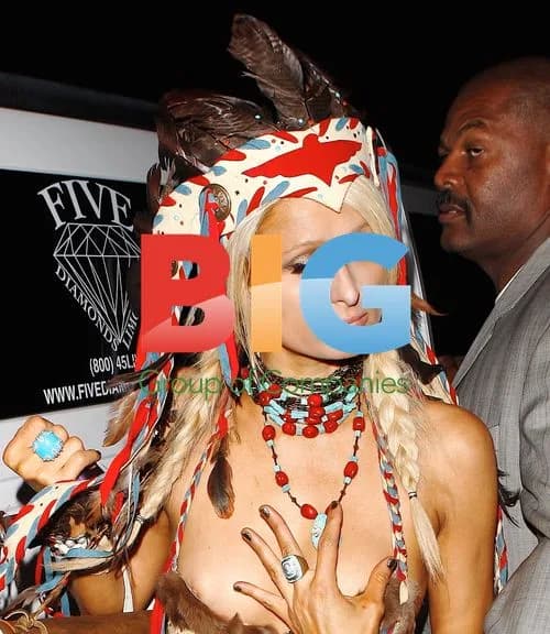 Paris Hilton Nipple Slip at Playboy Party