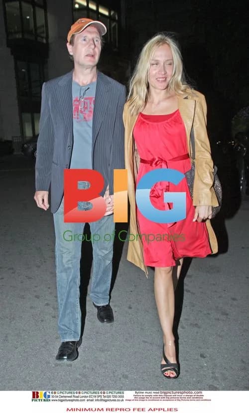 Liam Neeson with mystery blonde companion