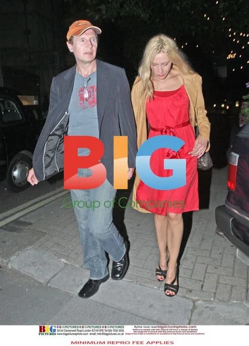 Liam Neeson spotted with mystery woman
