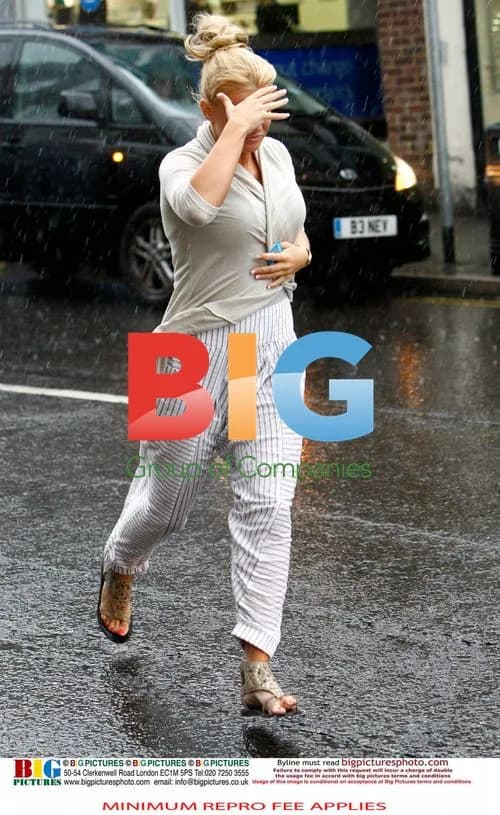 Kerry Katona Caught in Downpour