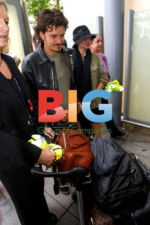 Orlando Bloom and Miranda Kerr at Heathrow