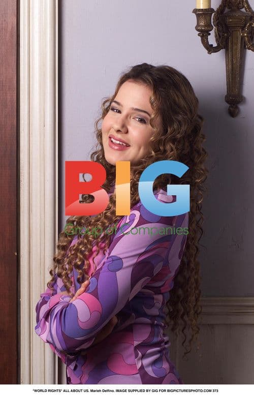 Marieh Delfino in Patterned Top