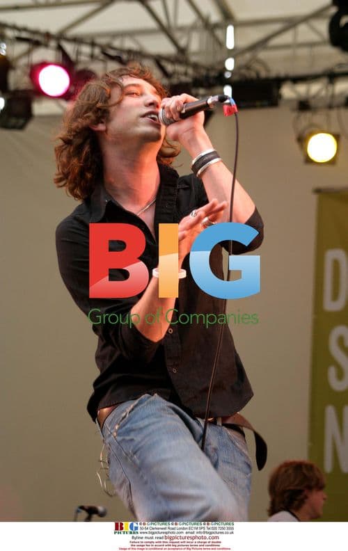 Singer Nick Atkinson of Rooster on stage