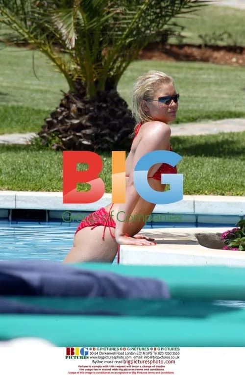 Suzanne Shaw Relaxes by Pool
