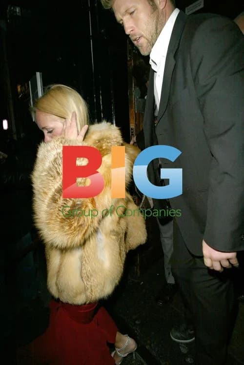 Mike Tyson leaving club with mystery girl