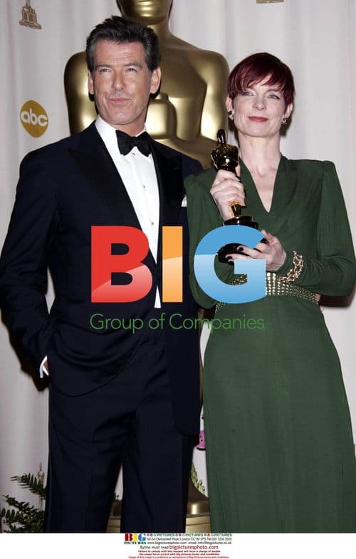 Pierce Brosnan and Sandra Powell at 77th Oscars