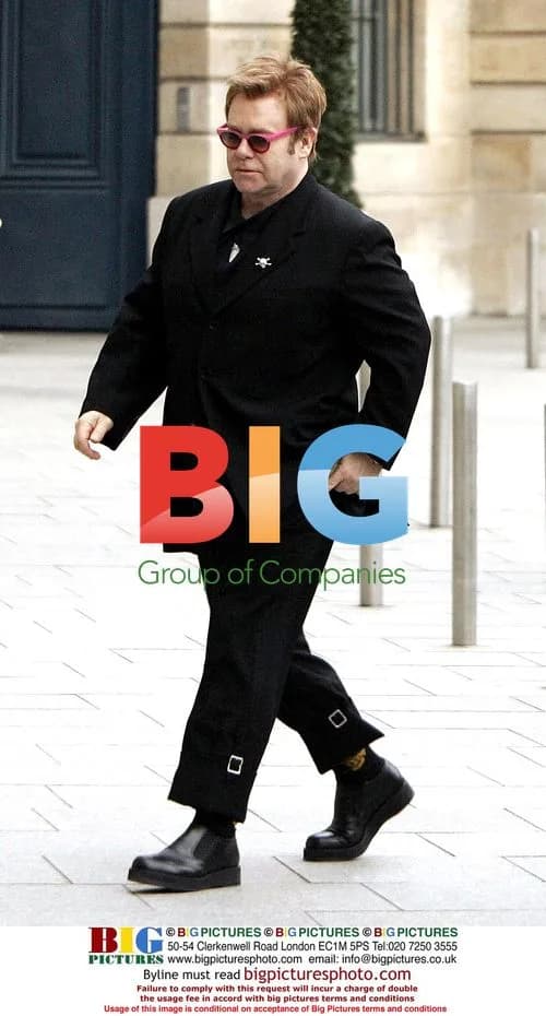 Elton John arrives at Ritz Hotel in Paris