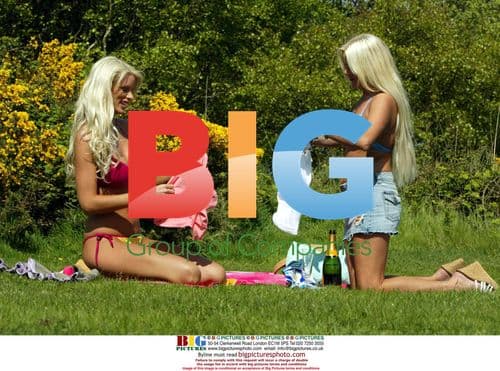 Model Emma B and friend Fionna relax in park