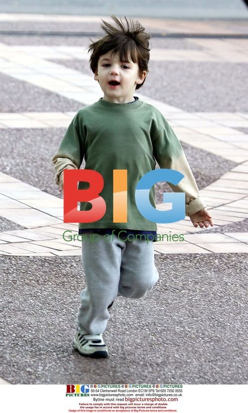 Harrison Ford Arrives on Set with Girlfriend and Son