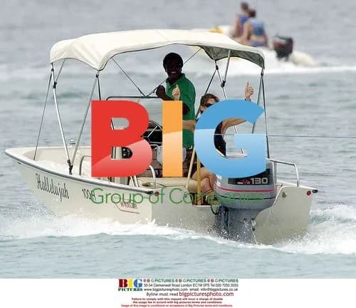 Hugh Grant water skiing in Barbados