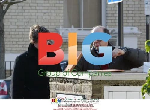 Hugh Grant Considers Roof Tiles