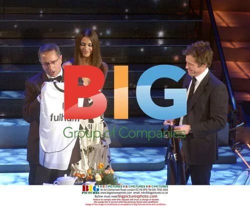 Hugh Grant and Paolo Bonolis at Italian Song Festival