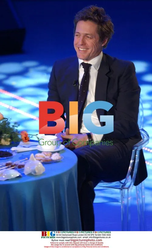 Hugh Grant and Paolo Bonolis at 58th Italian song festival