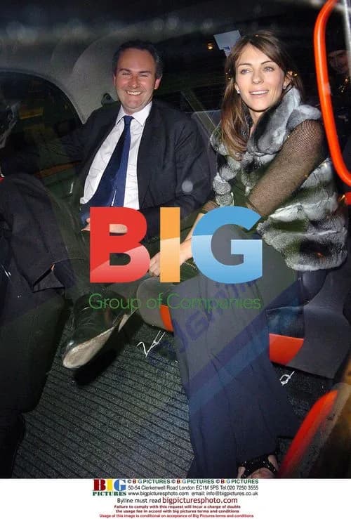 Liz Hurley leaving The Ivy with a mystery man