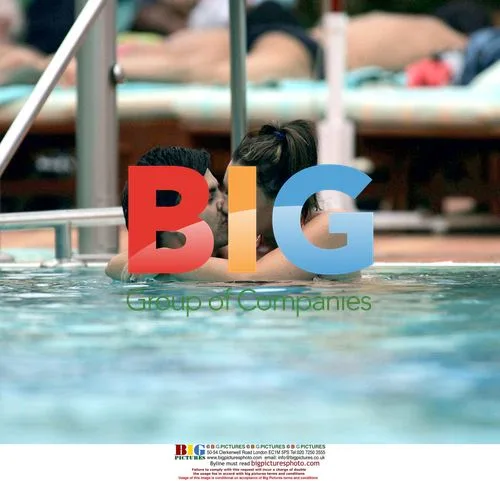 Michelle Heaton and Andy Scott-Lee Relaxing by Pool