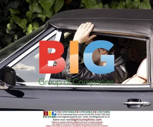 Olivier Martinez cruising in Aston Martin