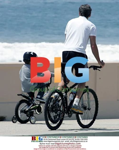 Pierce Brosnan and son Paris bike riding