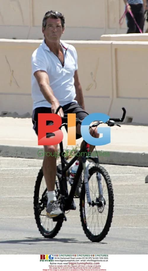 Pierce Brosnan and son Paris bike riding