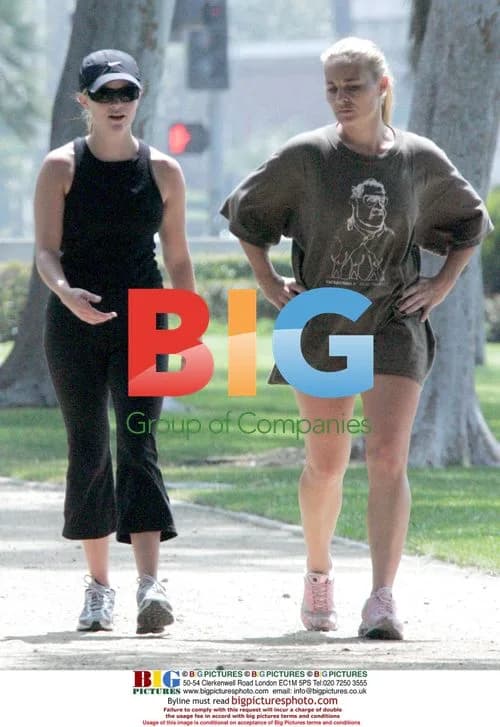 Reese Witherspoon runs with friend in Brentwood