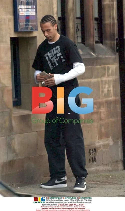 Rio Ferdinand uses cash point in Manchester