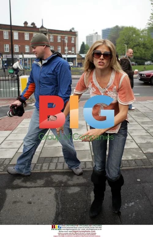 Sienna Miller Shoves Paparazzi in London