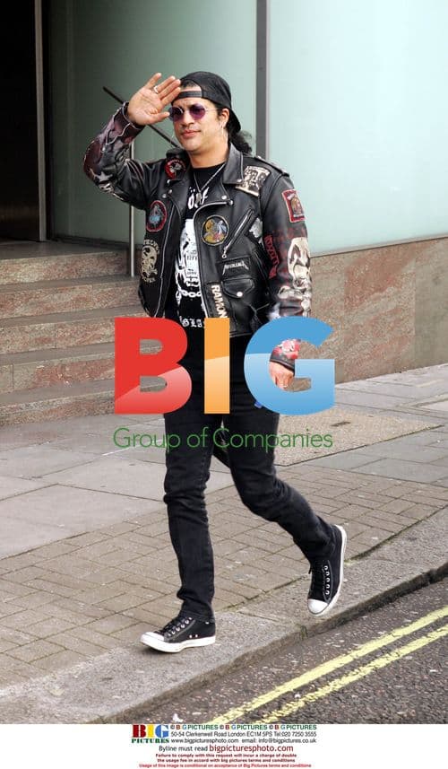 Slash Signing Autographs in London