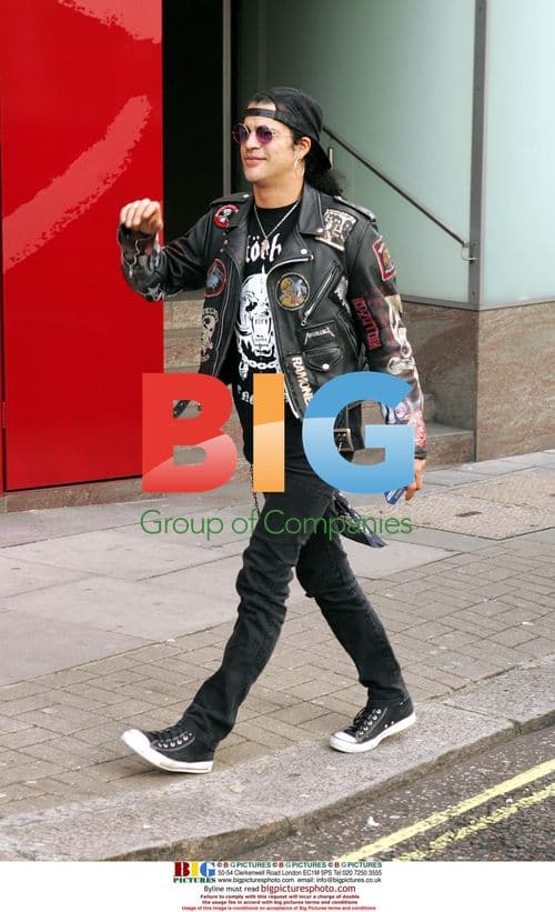 Slash Signing Autographs in London