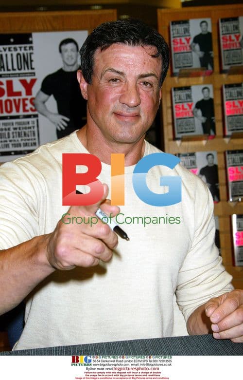 Sylvester Stallone Signs Book