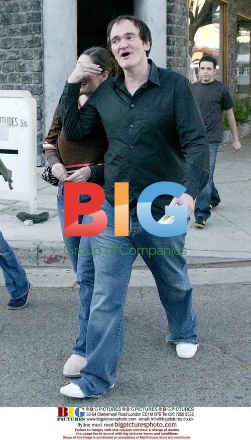 Quentin Tarantino with friends outside the Ivy